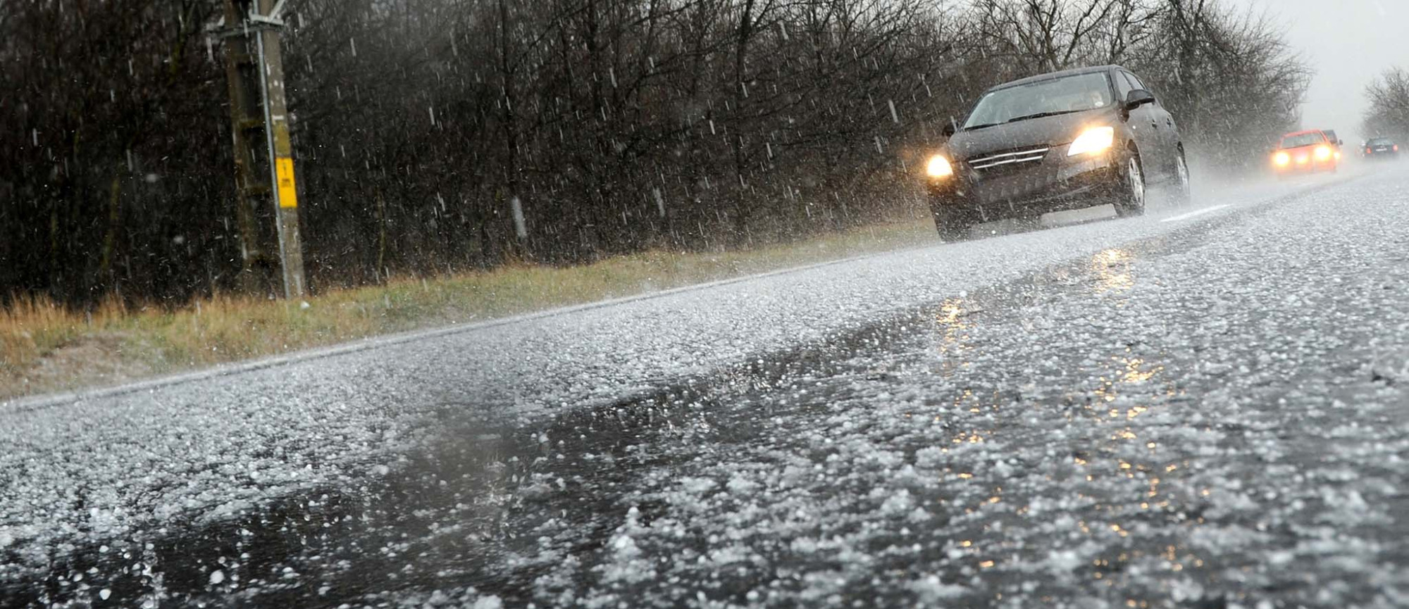 Hail Falling on Vehicles and Road