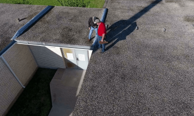 Mark Merdian Working on Roof